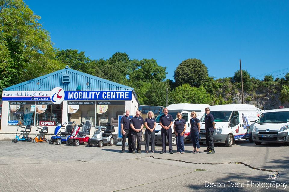Outside the Cavendish Mobility & Health Care showroom in Torquay (with staff)