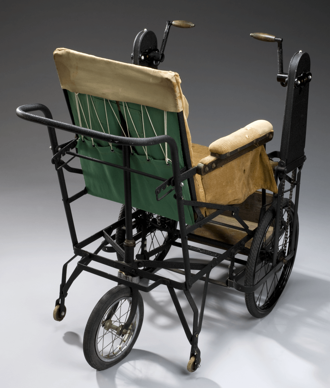 A hand-cranked wheelchair build between 1920-20